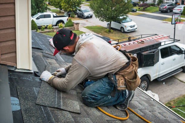 Professional Roofing technician working in Howe, ID